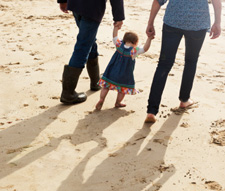 A young family enjoying the beach