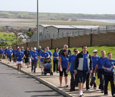 Employees take part in a 10K run