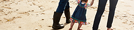 A young family enjoying the beach